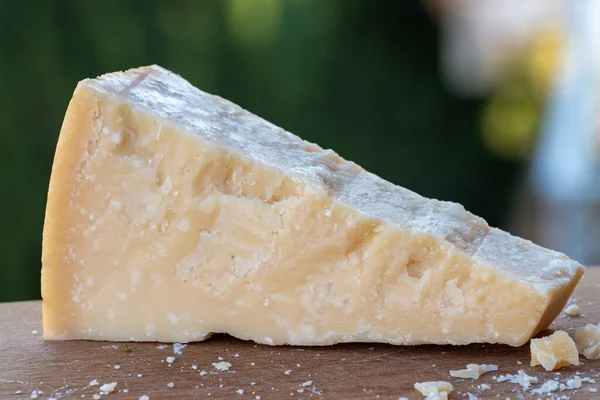 stock image Traditional italian food - 36 months aged in caves Italian parmesan hard cow milk cheese from Parma, Parmigiano-Reggiano, Italy