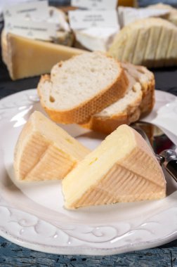 Munster gerome French cheese, strong-smelling soft cheese with subtle taste, made mainly from milk first produced in Vosges mountains, close up clipart