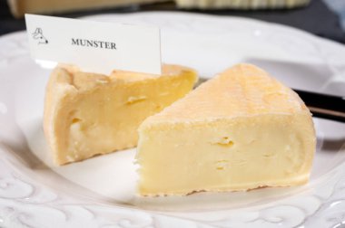 Munster gerome French cheese, strong-smelling soft cheese with subtle taste, made mainly from milk first produced in Vosges mountains, close up clipart
