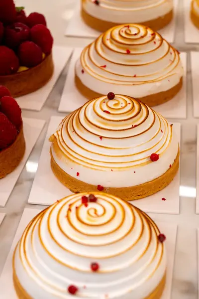 stock image Sweet dessert fresh baked meringue cakes in bakery shop