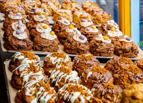 Stock image Scones - traditional British baked good, popular in the United Kingdom and Ireland, tea buns make with yeast with different toppings, close up