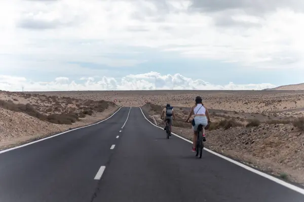 Stock image Mountain asphalt road on colourful remote basal hills and mountains of Massif of Betancuria, Fuerteventura, Canary islands, Spain, travel destination