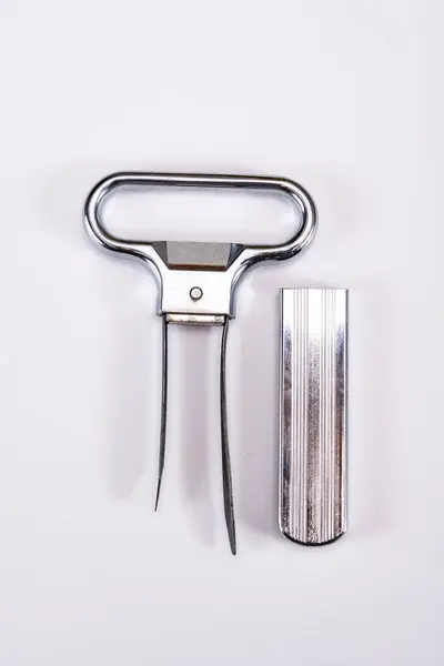 Stock image Corkscrew for opening of old bottles of wine, twin-prong cork puller can extract stopper without damage, on white background isolated