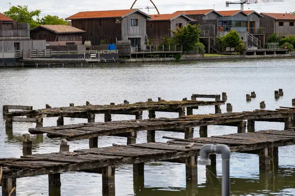 stock image Travelling in France, old wooden huts and oysters farms in Gujan-Mestras village, cultivation, fishing and sale of fresh oysters seashells, Arcachon bay, Atlantic ocean, France, tourists destination