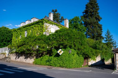 Souillac is small market town in Lot department in France, on river Dordogne in agricultural region known for its walnuts, strawberries, houses and streets clipart