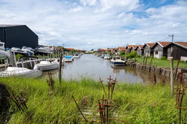 stock image Travelling in France, old wooden huts and oysters farms in Gujan-Mestras village, cultivation, fishing and sale of fresh oysters seashells, Arcachon bay, Atlantic ocean, France, tourists destination