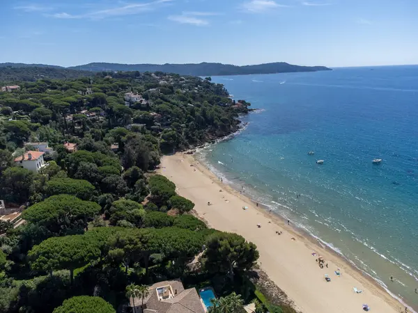 Stock image Aerial view on boats, crystal clear blue water of Plage du Debarquement white sandy beach near Cavalaire-sur-Mer and La Croix-Valmer, summer vacation on French Riviera, Var, Provence, France