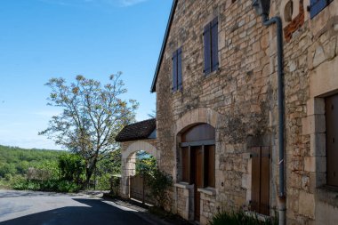 Souillac is small market town in Lot department in France, on river Dordogne in agricultural region known for its walnuts, strawberries, houses and streets clipart