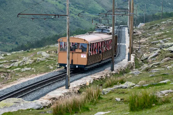 stock image Travelling by old wooden train up to Larrun or La Rhune, Larhune mountain at the western end of the Pyrenees located on border of France and Spain, in traditional Basque provinces of Labourd and Navarra.