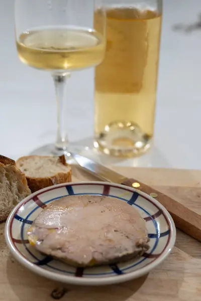 stock image Starter dish Foie gras fat liver specialty food product made of liver of a duck or goose fattened by gavage, force feeding, served with wine in French restaurant in Perigoed, Dordogne, close up