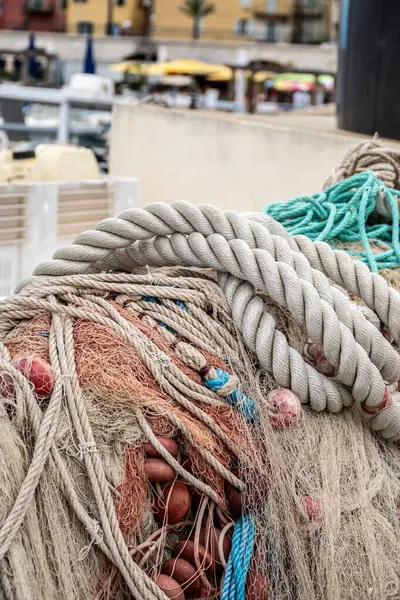 stock image Fisherman's boats, tackles and nets in harbour of coastal town Menton, French Riviera, France, close up, fishing in Mediterranean Sea