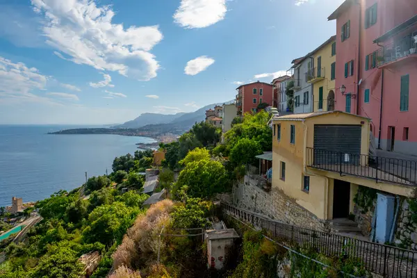 stock image Colourful view on Italian Riviera and blue Mediterranean Sea from French-Italian border in Grimaldi village, Ventimiglia near San-Remo, travel destination, panoramic view, houses and gardens