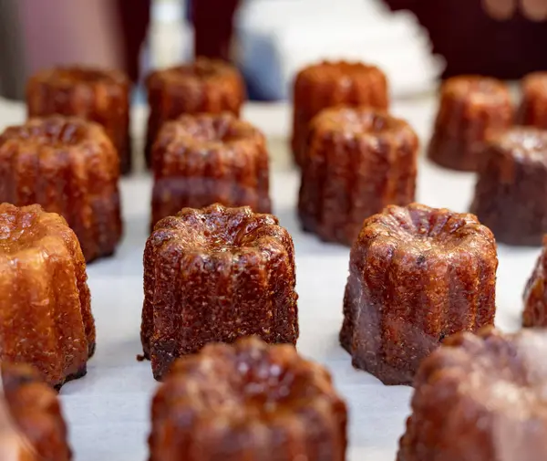 Stock image Baked Canele, French pastry flavored with rum and vanilla, specialty of Bordeaux region, France