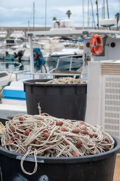 stock image Fisherman's boats, tackles and nets in harbour of coastal town Menton, French Riviera, France, close up, fishing in Mediterranean Sea