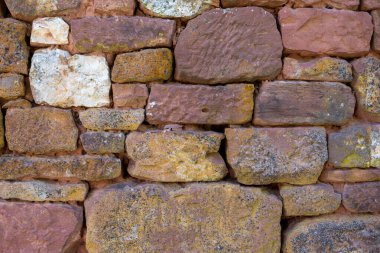 Red brick background in Collonges-la-Rouge village one of the most beautiful villages in France with houses made from red stones, tourists destination in Dordogne clipart