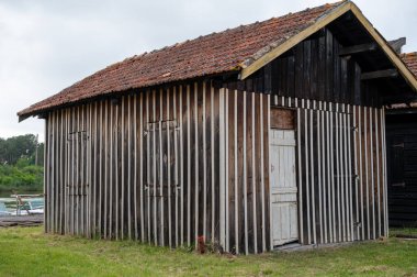 Travelling in France, old wooden huts and oysters farms in Gujan-Mestras village, cultivation, fishing and sale of fresh oysters seashells, Arcachon bay, Atlantic ocean, France, tourists destination clipart