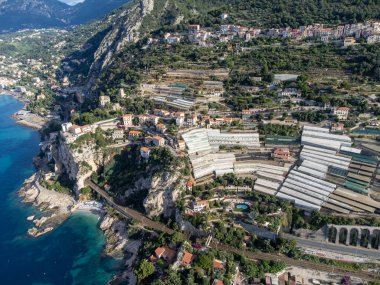 Aerial view on Italian Riviera and blue Mediterranean Sea from French-Italian border in Grimaldi village, Ventimiglia near San-Remo, travel destination, panoramic view from above clipart