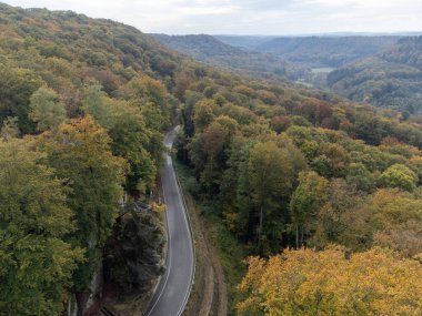 Aerial view on Mullerthal in autumn, Luxembourg's Little Switzerland, hiking routes, rock formations, moss-covered forests, tourist destination in Europe clipart