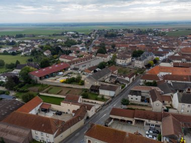 Harvest time on grand cru vineyards near Ambonnay and Bouzy, region Champagne, France. Cultivation of white chardonnay and black pinot noir wine grapes, aerial view on vineyards clipart