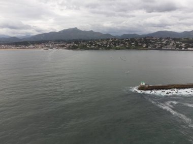 Aerial view on Ciboure and Saint Jean de Luz towns bay, port, sandy beach on Basque coast, beautiful architecture, nature and cuisine, South of France, Basque Country clipart