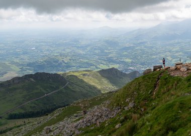 Travelling by old wooden train up to Larrun or La Rhune, Larhune mountain at the western end of the Pyrenees located on border of France and Spain, in traditional Basque provinces of Labourd and Navarra. clipart