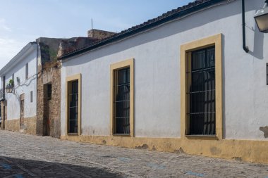 Walking in old part of Jerez de la Frontera, Sherry wine making town, Andalusia, Spain in summer, architectural details, Andalusian style, white houses clipart