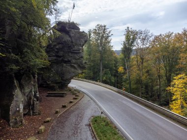 Aerial view on Mullerthal in autumn, Luxembourg's Little Switzerland, hiking routes, rock formations, moss-covered forests, tourist destination in Europe clipart