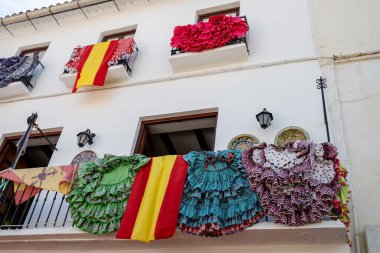 Pearl of Costa del Sol, colourful Marbella touristic town, view of old town with white houses, decoration, narrow strets and flowers, Andalusia, Spain clipart