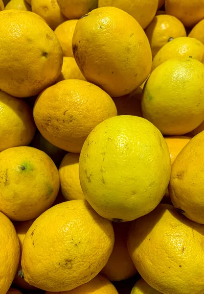 stock image a bunch of lemons in the fresh market