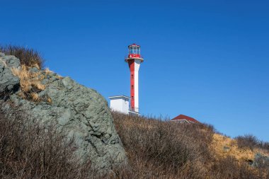 Cape Forchu Lighthouse in Yarmouth, Nova Scotia, Canada, Overlooking the Atlantic Ocean clipart