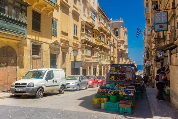 Valletta, Malta, 22 May 2022: Street in the old town center of Valletta