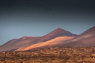 Wild volcanic landscape of the Timanfaya National Park, Lanzarote, Canary Islands, Spain