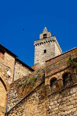 Ancient medieval tower in the town center of San Gimignano, Tuscany, Italy