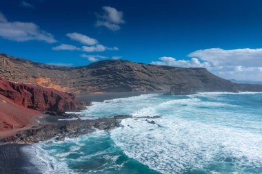 Lanzarote, Spain, 20 March 2022: The Atlantic Ocean at El Golfo black volcanic beach