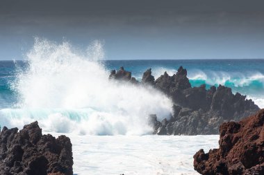 Powerful waves against the sea stacks of Lanzarote island, Atlantic Ocean, Canary Islands, Spain
