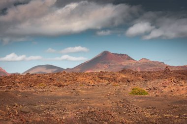 Wild volcanic landscape of the Timanfaya National Park, Lanzarote, Canary Islands, Spain