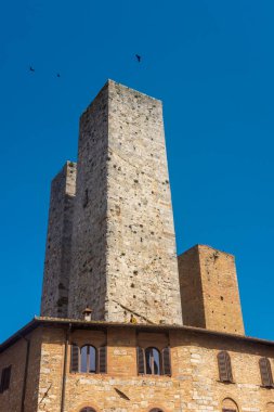 Ancient medieval tower in the town center of San Gimignano, Tuscany, Italy