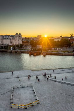 Oslo, Norway, 7 August 2022: Beautiful sunset over Oslo from the Opera House
