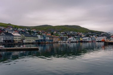 Honningsvag, Norway, 13 August 2022: The harbor of Honningsvag, considered the northernmost town in the world, a few kilometers down North Cape