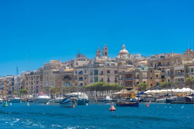 Birgu, Malta, 22 May 2022: View of Cospicua, one of the three cities, from the marina of Birgu
