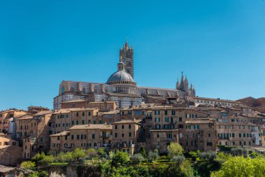 Siena, Italy, 17 April 2022: Beautiful cityscape of the medieval historic center