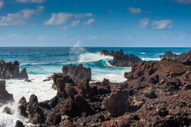 Powerful waves against the sea stacks of Lanzarote island, Atlantic Ocean, Canary Islands, Spain