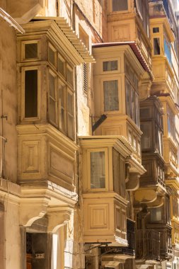 Traditional maltese balconies in the old town of Valletta, Malta
