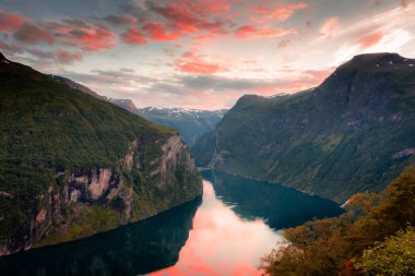 Sunset over the Geirangerfjord and the Seven Sisters Waterfall, Norway