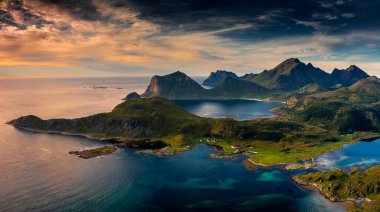 Amazing panorama of the Lofoten Islands sunset from Offersoykammen mount trail, Norway