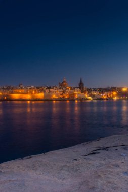 Skyline of Valletta by night, view from Sliema, Malta