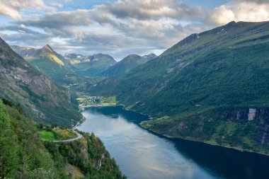 Sunset over the Geirangerfjord and the Seven Sisters Waterfall, Norway