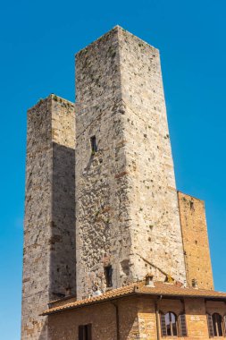Ancient medieval tower in the town center of San Gimignano, Tuscany, Italy