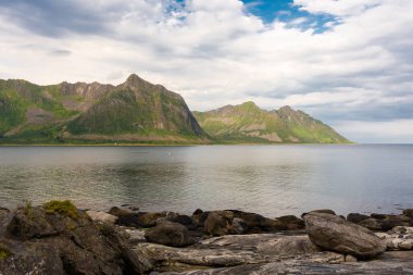 The Tungeneset (Devil's Teeth), mountains over the ocean in Senja Island, Norway