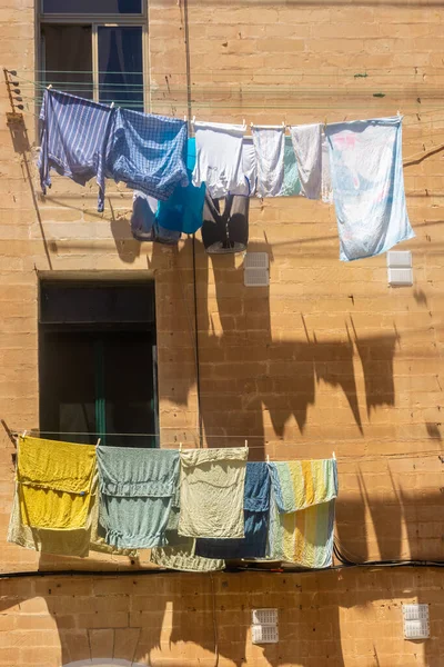 Hanging clothes in old town Valletta, Malta